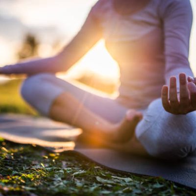 Close up of yoga outdoor at sunset. Close up of yoga outdoor at sunset.
